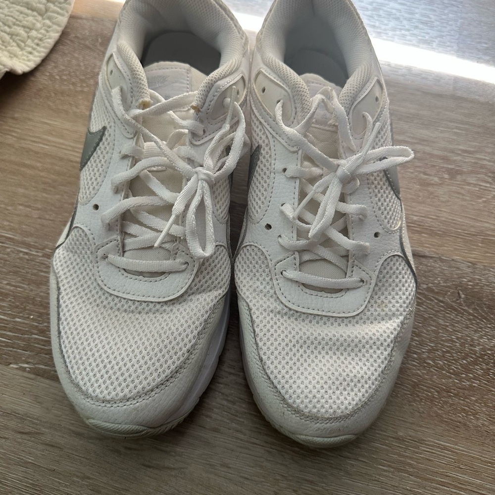 Nike White Sneakers with Breathable Mesh and Textured Sole